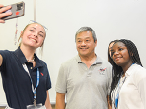 Aviation students engaging with guest speaker Dr. Leroy Chiao