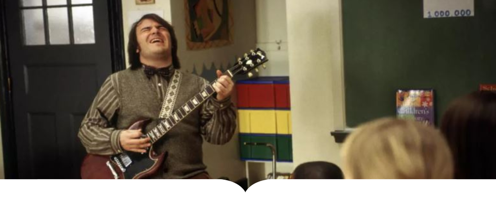 Jack Black from School of Rock plays guitar